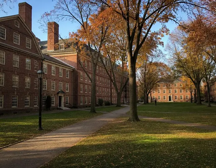 A red brick American university campus in autumn